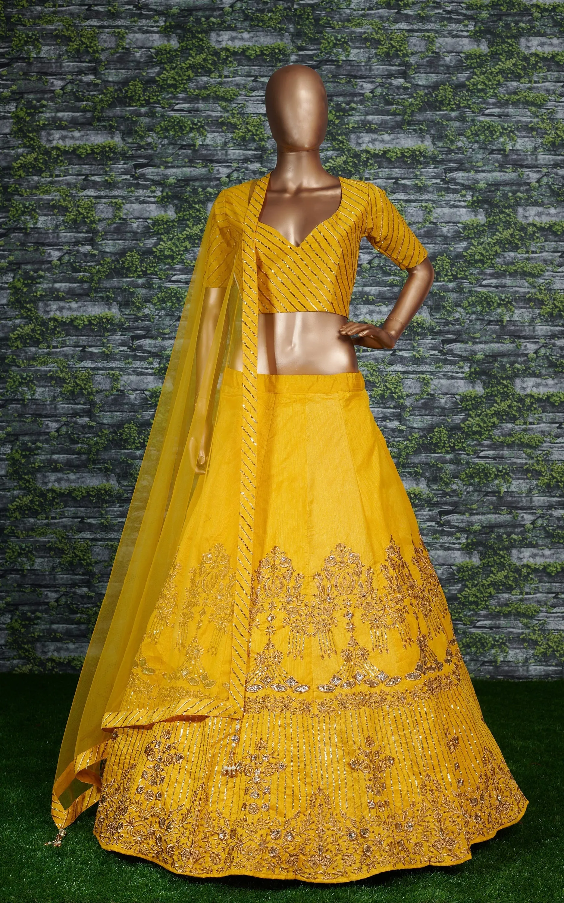 Sophisticated Yellow Colored Party wear Embroidered Lehenga Choli